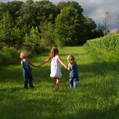 Kids in a farm field